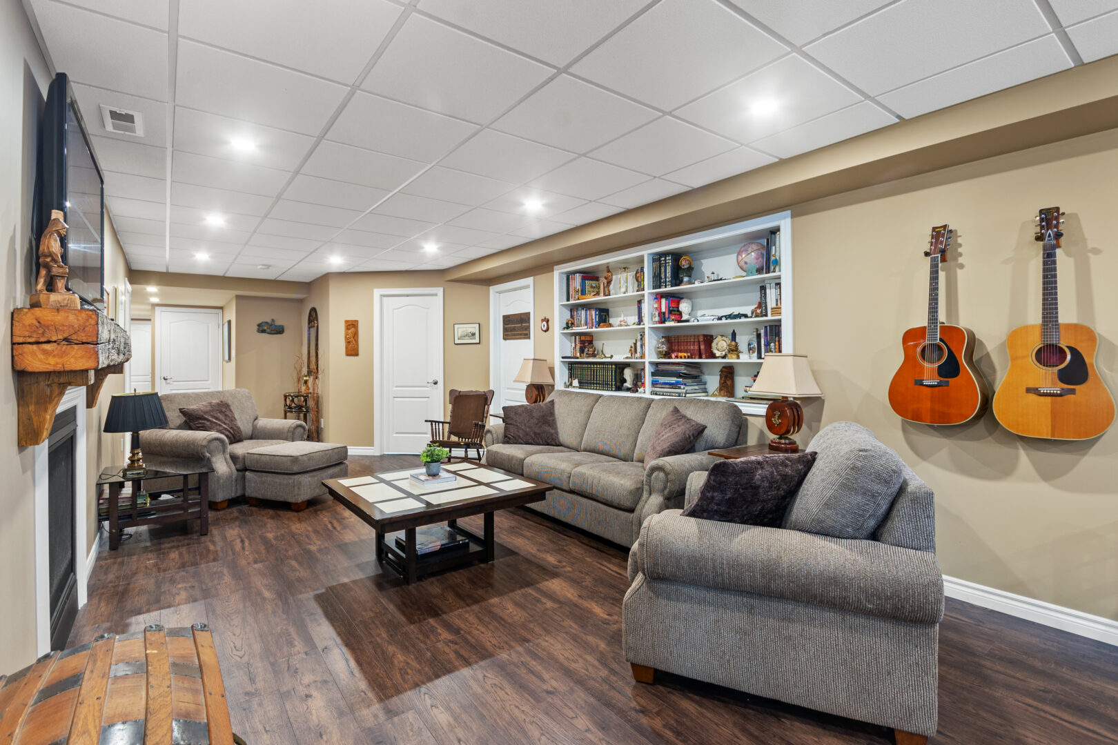 Grey couches in a basement living room