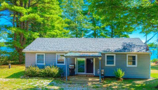 A grey bungalow cottage