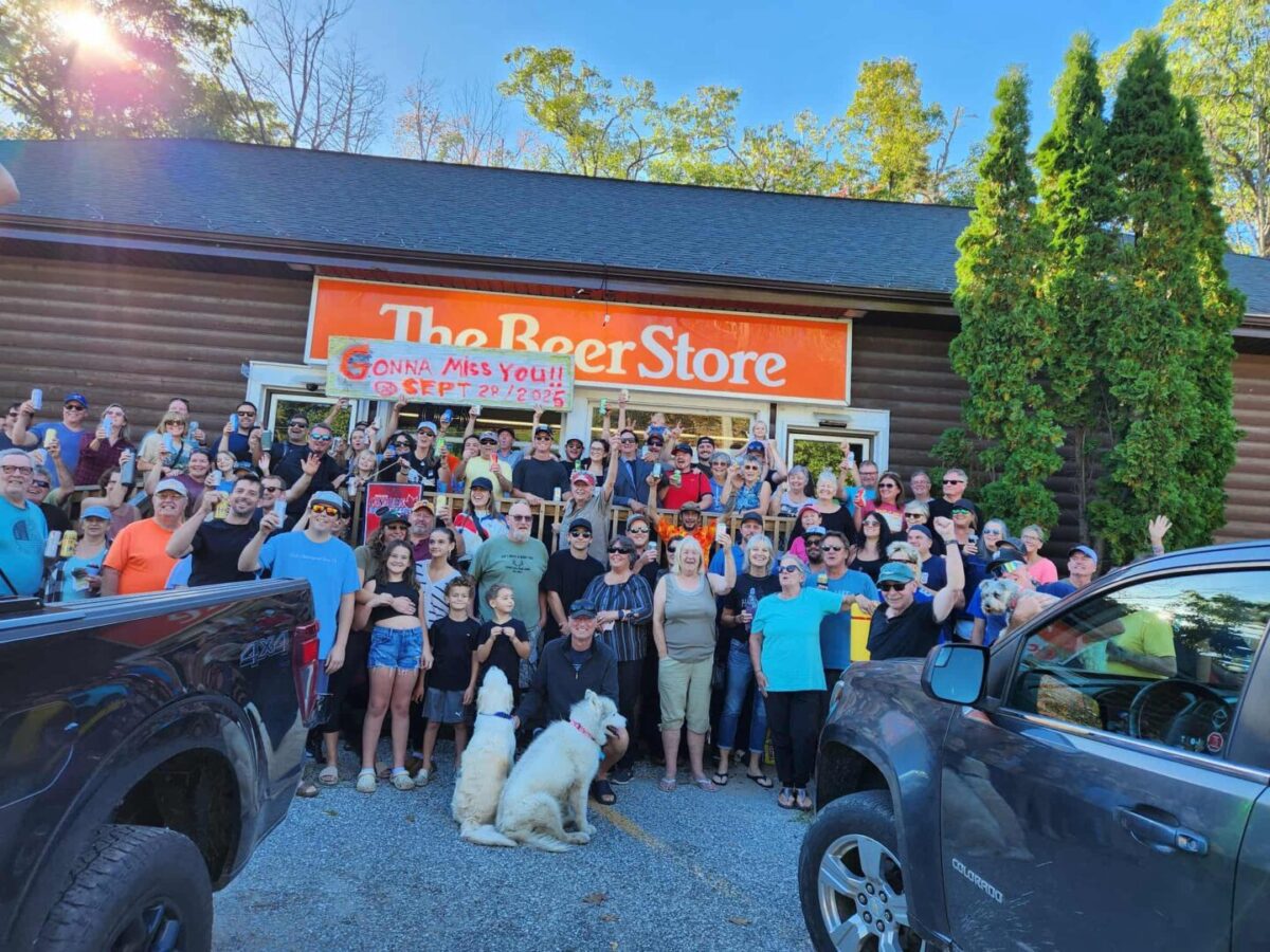 Crowd gathered in front of the Bala Beer Store on the day of its closure
