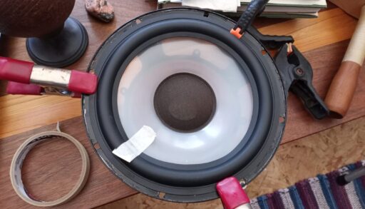 A vintage speaker undergoing repair