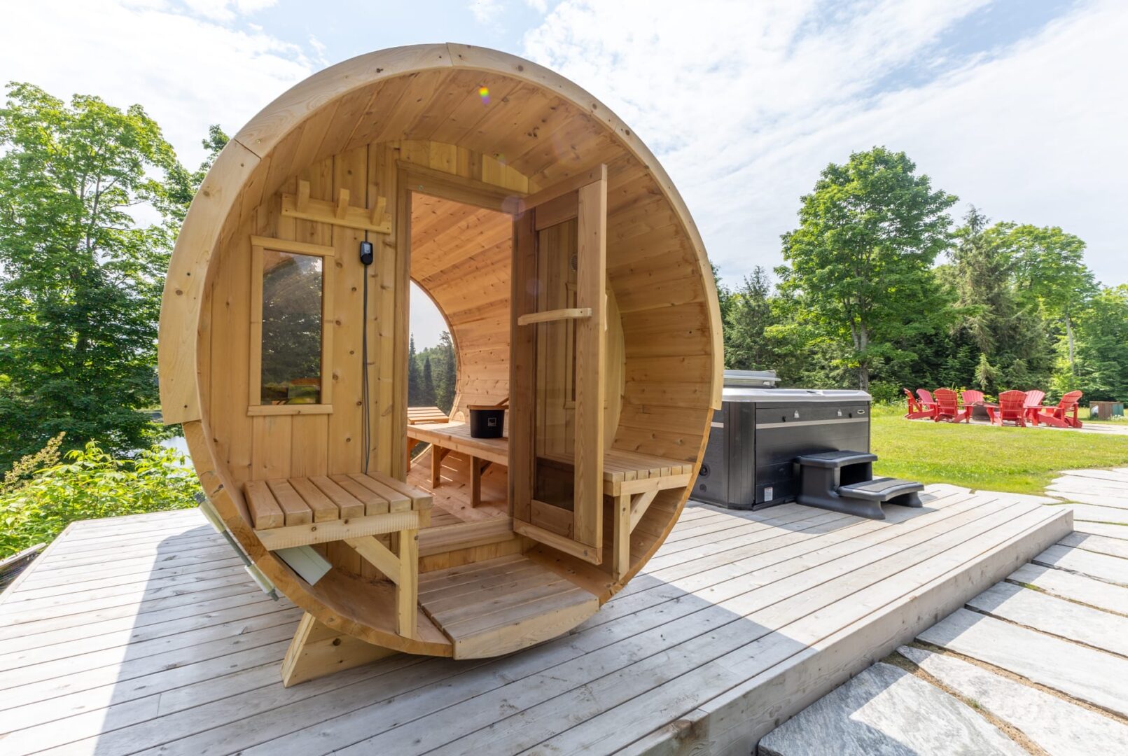 A barrel sauna on a raised platform