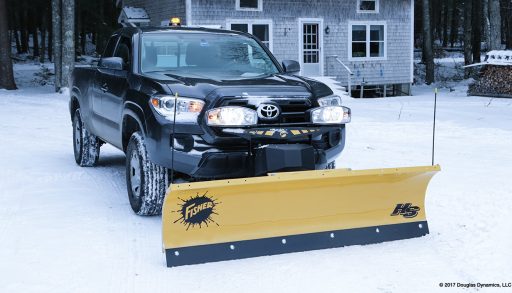 A truck with a straight blade plow attachment