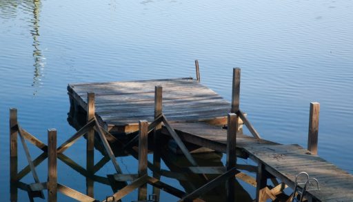 An old dock on a quiet lake
