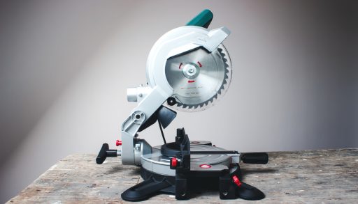 A compound mitre saw sitting on a table