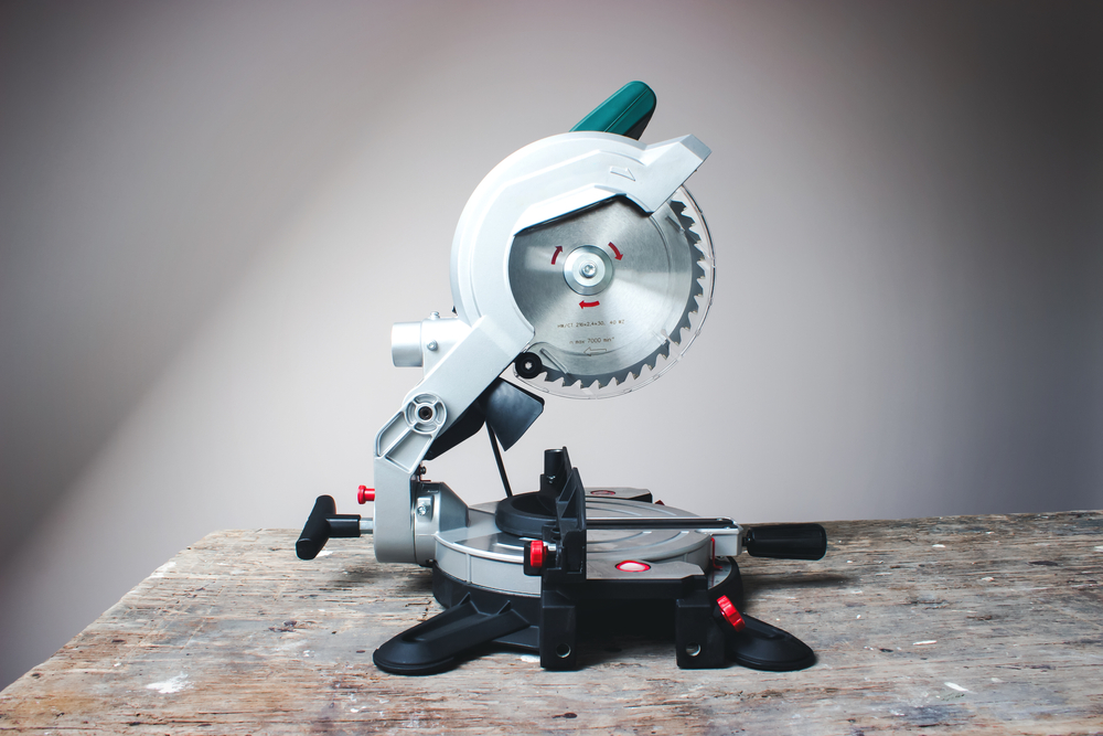 A compound mitre saw sitting on a table