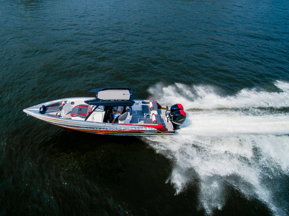 A power boat speeding down the lake